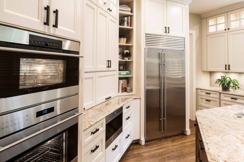 Marble & Wood 4 old world kitchen with pullout Wolf drawer microwave appliance, coffee center and double ovens