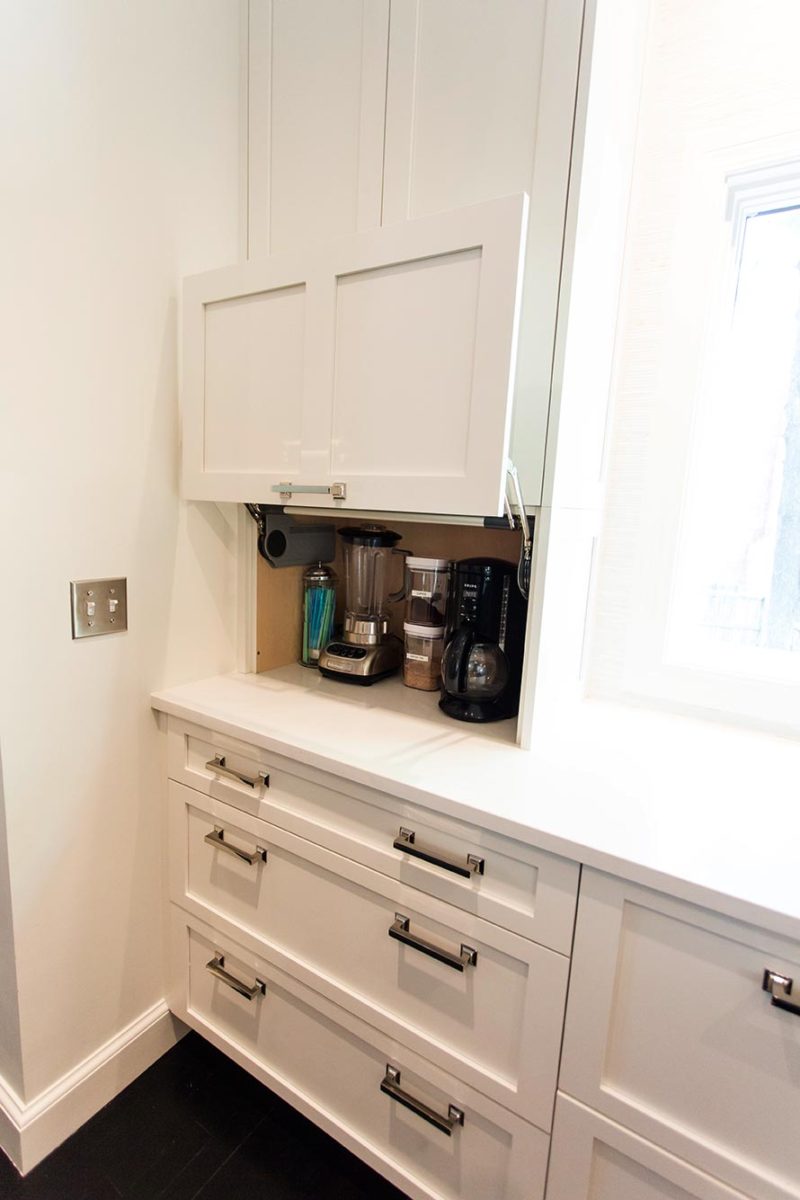 White Done Right 5 elegant open kitchen with concealed coffee and beverage storage